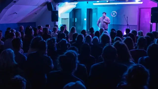 A packed room at The Attic Comedy Club